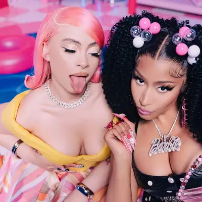 Ice Spice next to nicki Minaj with a barbiecore pink malt shop bob
