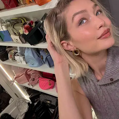 gigi Hadid with a blonde, flippy 