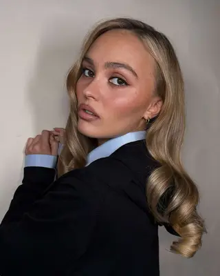 Lily Rose Depp wearing makeup. 