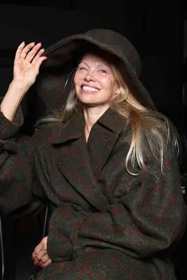 Pamela Anderson makeup-free at Vivienne Westwood Womenswear Spring/Summer 2024 show