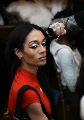 A dramatic smoky eye and bold contour at the FW 2025 Kim Shui show