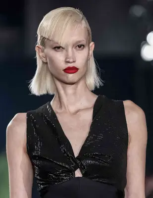 a model with an angular bang at the christopher john roger fw 2025 fashion show