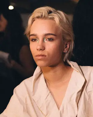 a model with a pop of color in their inner corners 