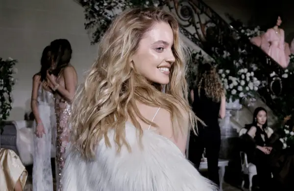 a model in bold makeup at the melke show