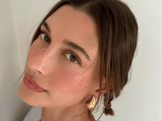 Hailey Bieber wearing strawberry makeup
