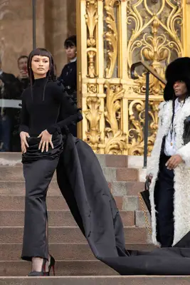 Zendaya at the Schiaparelli Haute Couture Show with edgy jet-black blunt bangs 