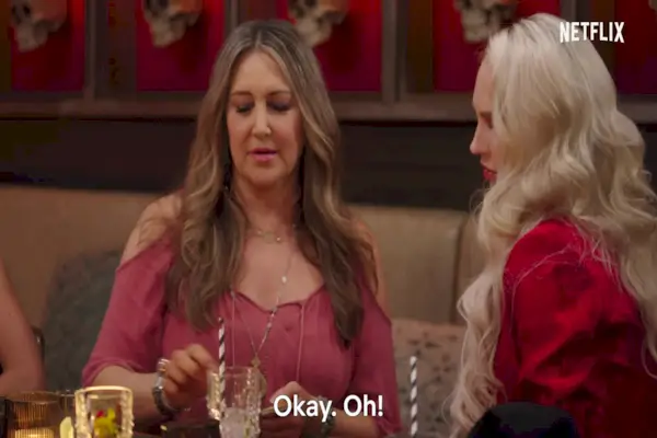 two hands reaching for each other