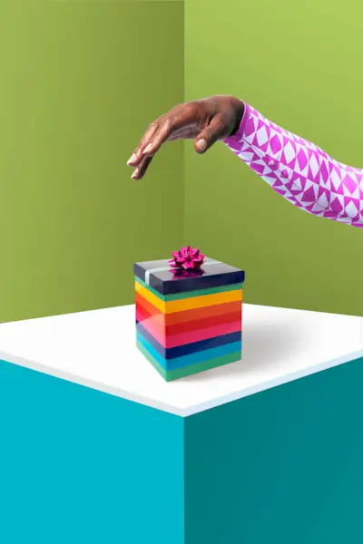 hand above colourful gift