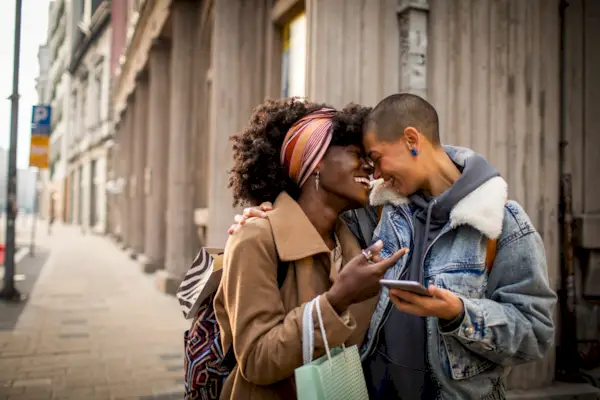 Young female couple shopping and exploring the city