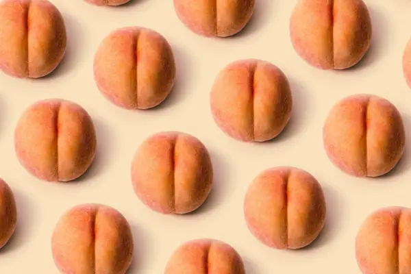 Fresh Peach on Peach Colored Background
