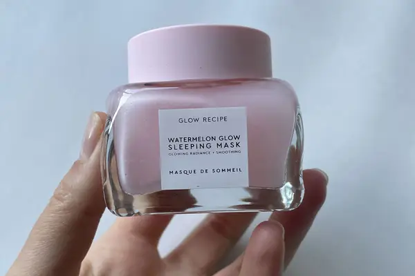 A hand holding Glow Recipe