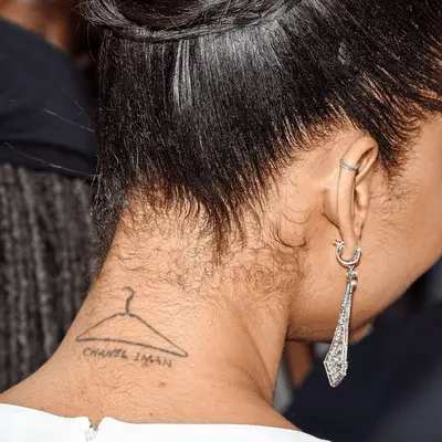 Chanel Iman clothes hanger neck tattoo 