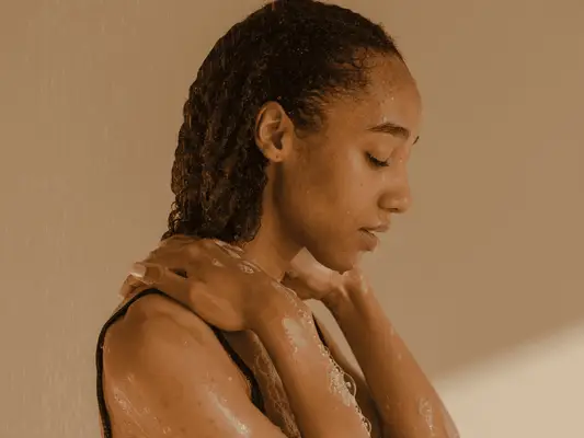 woman washing her skin