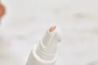 Close up of ILIA Bright Start Retinol Alternative Brightening Eye Cream applicator.