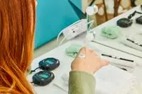 Hand with dab of mineral sunscreen