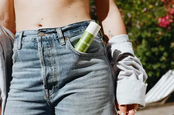 woman with Personal Day product in her pocket