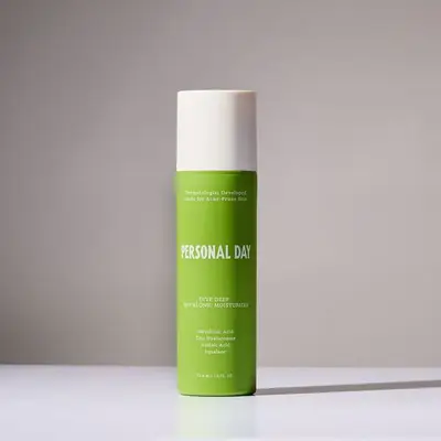 Personal Day moisturizer on a white background.
