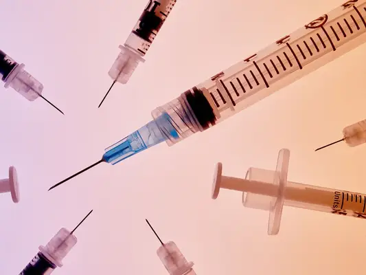 Syringes on an ombre background
