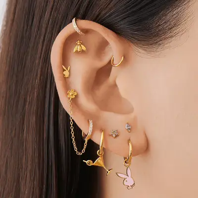 Earscaped ear with cartilage and lobe piercings featuring stacked earlobe