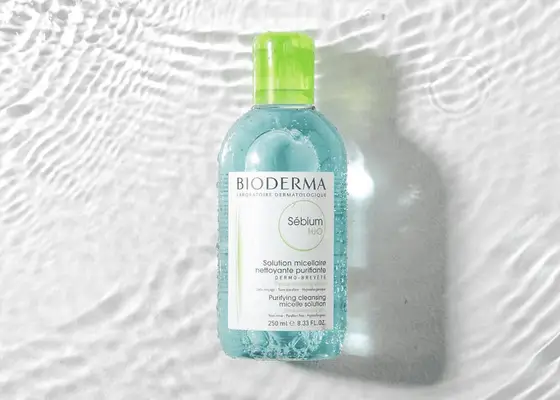 bioderma micellar water on light watery background