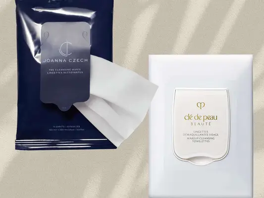 Collage of two makeup remover wipes, Joanna Czech and Clé de Peau, on a tan background