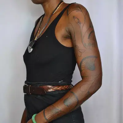 Egyptian Lotus Flowers arm tattoo