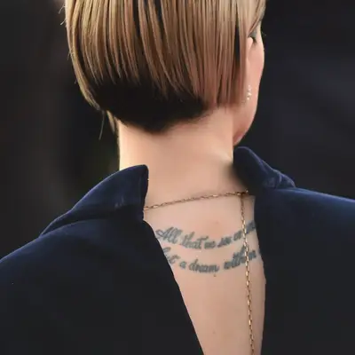Evan Rachel Wood upper back word tattoo