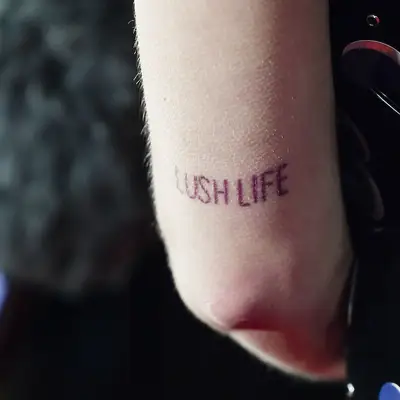 Lush Life word tattoo on Zara Larsson