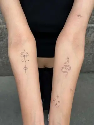 forearm with flower tattoo