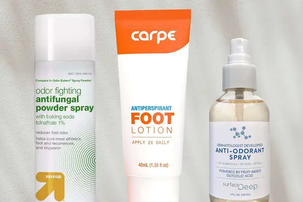 Collage of foot antiperspirants including Carpe Antiperspirant Foot Lotion and Surface Deep Anti-Odorant Spray on a gray background