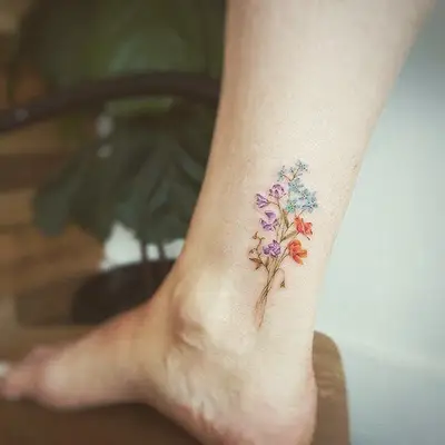Pastel bouquet ankle tattoo