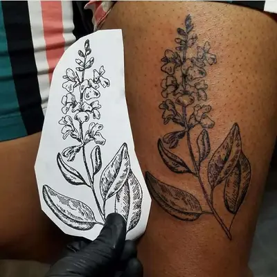 Sage branch leg tattoo