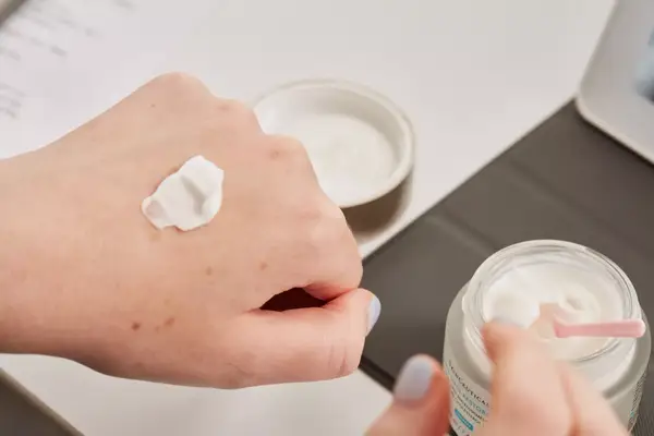 SkinCeuticals Triple Lipid Restore 2:4:2 on the back of a person