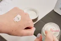 SkinCeuticals Triple Lipid Restore 2:4:2 on the back of a person