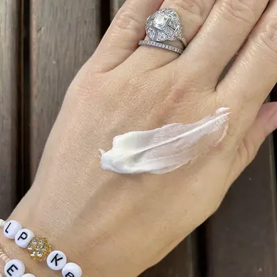 Moisturizer on the back of a hand