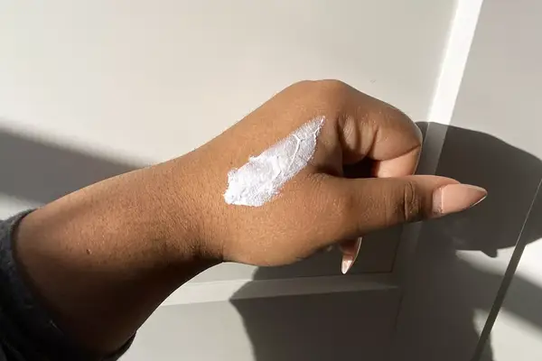 A spread of moisturizer displayed on a hand