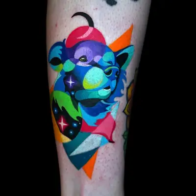 Multicolored rainbow colorblock tattoo of a dog on the back of the leg