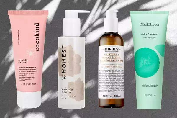 An assortment of natural face washes against a neutral background, including options from Cocokind, Honest, Kiehl