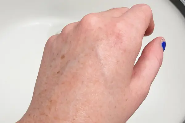 a photo of the back of a hand after using the Sol de Janeiro hand cream