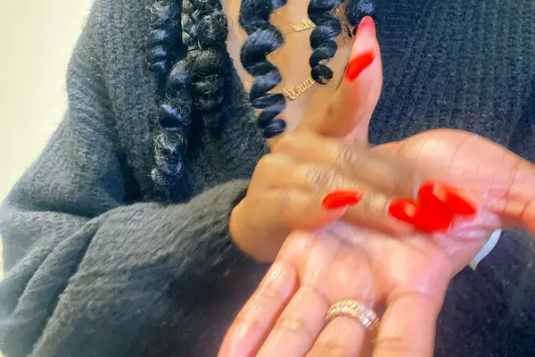 A person rubbing their hands together with the Skinfix repair cream