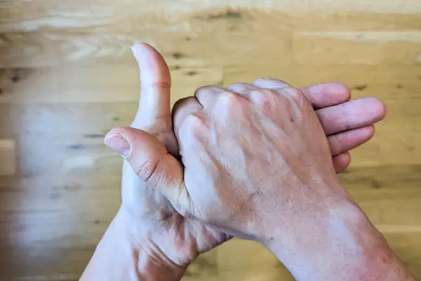 Hands rubbing together