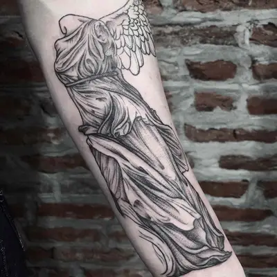 image of black ink fine line tattoo on foreaem