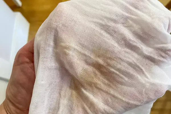 Eve Lom 3 Muslin Cloth with makeup on it