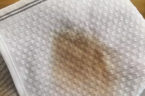 Coyuchi Mediterranean Organic Washcloth with a stain on it