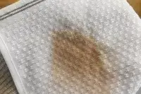 Coyuchi Mediterranean Organic Washcloth with a stain on it