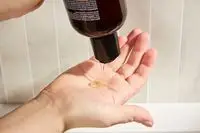 Person dispenses Maude pH-Balanced Body Wash and Bubble Bath into their hand