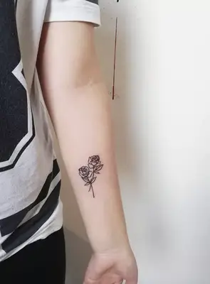  Double Rose Tattoo on forearm