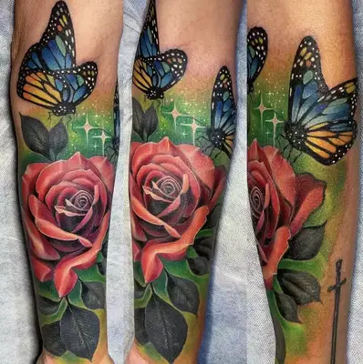 rose with butterflies tattoo on leg