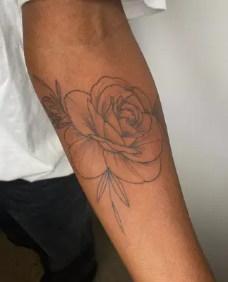 forearm rose tattoo