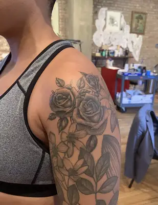 floral mix tattoo on shoulder